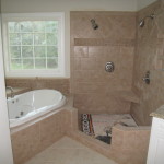 Custom bathtub and shower installations finished by home remodeling company Hedrick Creative Building, LLC in Lexington, NC